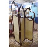 Edwardian three fold dressing screen with glazed top over fabric panels, in a mahogany frame with