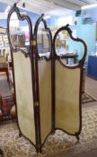 Edwardian three fold dressing screen with glazed top over fabric panels, in a mahogany frame with