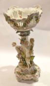 Large Continental porcelain centrepiece, the bowl supported by a pedestal with three nymphs above