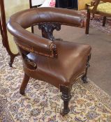 Early 19th century mahogany elbow or cockfighting type chair, heavy arm rests raised on scrolled