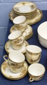 Noritake tea set with gilt design comprising nine cups, saucers, side plates and serving plates (