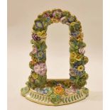 19th century English Bower frame encrusted with flowers on semi-circular base