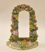 19th century English Bower frame encrusted with flowers on semi-circular base