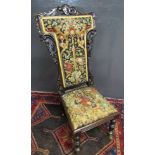 Mahogany prie-dieu chair, scroll moulded cruciform back and also possibly with original