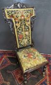 Mahogany prie-dieu chair, scroll moulded cruciform back and also possibly with original