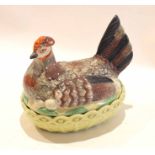 Late 19th century Staffordshire type hen tureen, the base modelled as a basket with hen and eggs