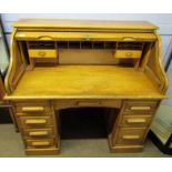 Early 20th century oak roll top desk, the lid with presentation plaque "George A Stephen, City