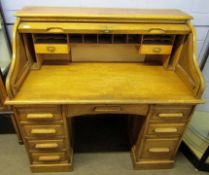 Early 20th century oak roll top desk, the lid with presentation plaque "George A Stephen, City
