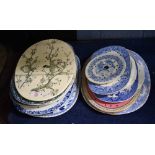 Group of mid/late 19th century English pottery strainers with various designs in blue and white