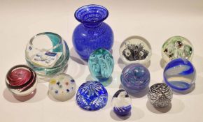 Quantity of glass paperweights with various designs including Langham Glass examples and