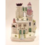 Staffordshire model of a castle with lustre type decoration