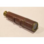 Vintage leather mounted two-draw brass telescope, 26cm long