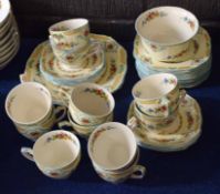 Circa 1930s Alfred Meakin part tea set with ten cups, saucers and side plates and two serving dishes