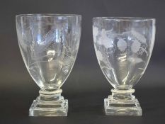 Two large late 19th/early 20th century glass rummers with an engraved floral design above a