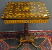 Decorative inlaid pedestal work or games table, profusely inlaid throughout with floral marquetry