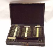 Cased set of optical lenses manufactured by the American Optical Co, South Bridge, Mass, circa