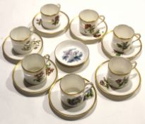 Collection of Royal Worcester coffee cans and saucers, all painted with floral subjects, together