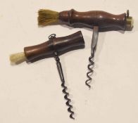 Two vintage spring handled corkscrews each with brushes