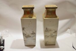 Two large Japanese Kutani porcelain vases, Meiji period, the tapered vases decorated with