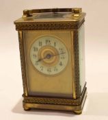 Late Victorian French brass carriage clock, with circular Arabic chapter ring, 12cm high