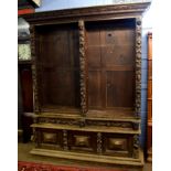 Victorian Gothic oak bookcase, moulded cornice over two open sections with adjustable shelving,