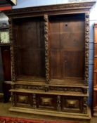 Victorian Gothic oak bookcase, moulded cornice over two open sections with adjustable shelving,