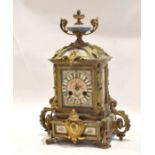 19th century French brass and Sevres (Paris) mounted mantel clock, crested with an urn finial over a