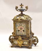 19th century French brass and Sevres (Paris) mounted mantel clock, crested with an urn finial over a
