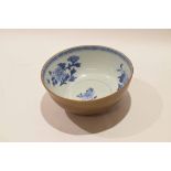 Chinese porcelain Nanking cargo bowl, chocolate brown exterior, interior decorated with blue and