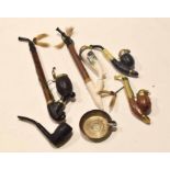 Box containing mixed European pipes etc