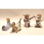 Group of Lladro figurines including two cherubs, one with harp, the other with banjo and two further