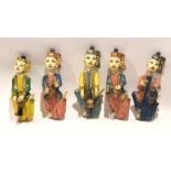 Set of five painted Eastern or Oriental figures in the form of female musicians, 18cm high