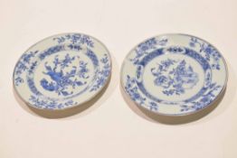 Two mid-18th century Chinese export porcelain plates both with blue and white floral designs