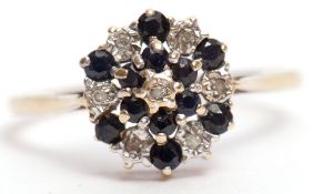 9ct gold sapphire and diamond cluster ring, the flowerhead featuring 12 small circular cut sapphires