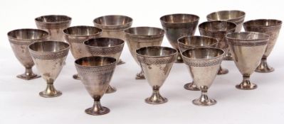 Set of 16 circa 1920s Ottoman Empire coffee cups of egg cup shape with banded engraved foliate