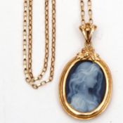 Vintage hardstone pendant, a profile of a lady's head, engraved verso J.W, framed in a 9ct gold