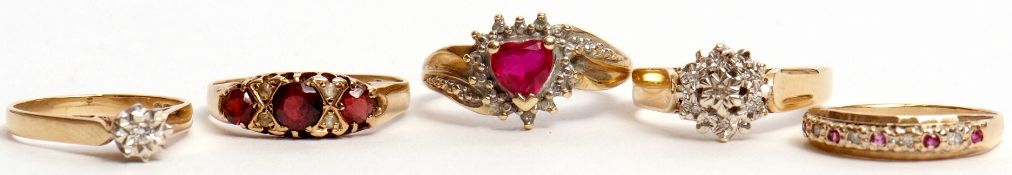 Mixed Lot: three modern 9ct gold diamond set rings, 9ct red stone and diamond ring, together with