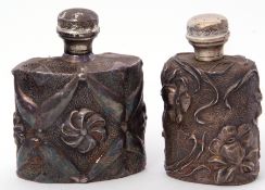 Two late 20th century Art Nouveau style silver plated spirit flasks, heavily chased with floral