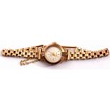 9ct gold ladies Accurist wrist watch on a 9ct gold brick link bracelet, gross weight 11.6gms