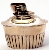 Edwardian table lighter of fluted oval form with concave apron, hinged domed lid with urn finial,