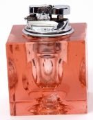 Mid-20th century pink glass and chromium table lighter of cuboid form, having dimpled sides, 7cm