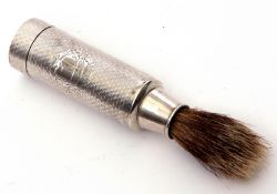 Victorian silver encased shaving brush of travelling type, the engine turned cylindrical body with