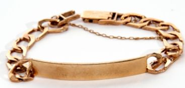 9ct gold identity bracelet, the elongated curved panel engraved with the name "RON" to an oval plain