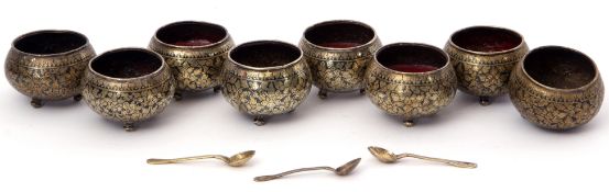 Set of six, probably Middle Eastern, low grade white metal salts with Niello and gilt decoration,