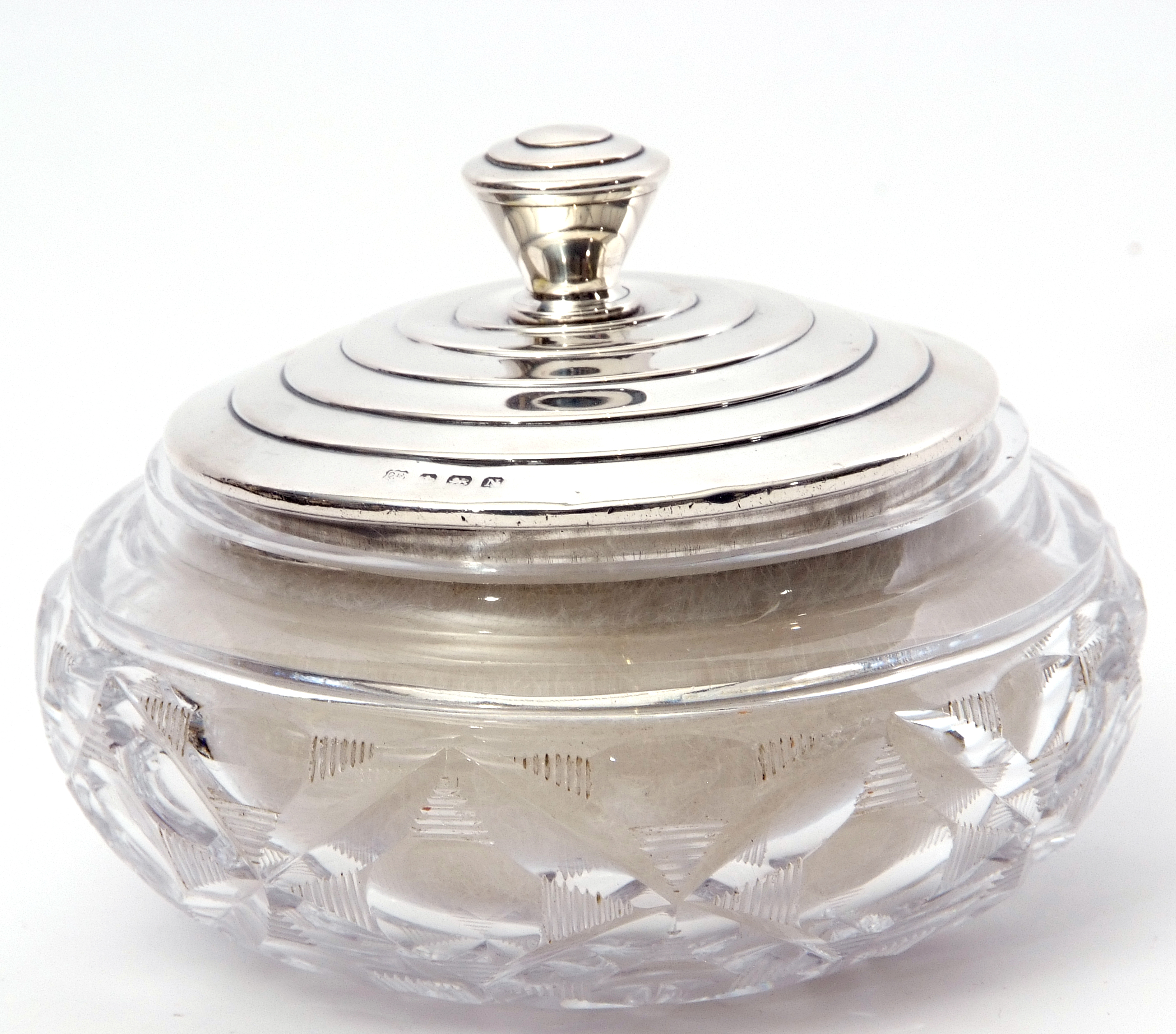 George VI silver lidded dressing table powder bowl in Art Deco style, the hobnail cut glass base