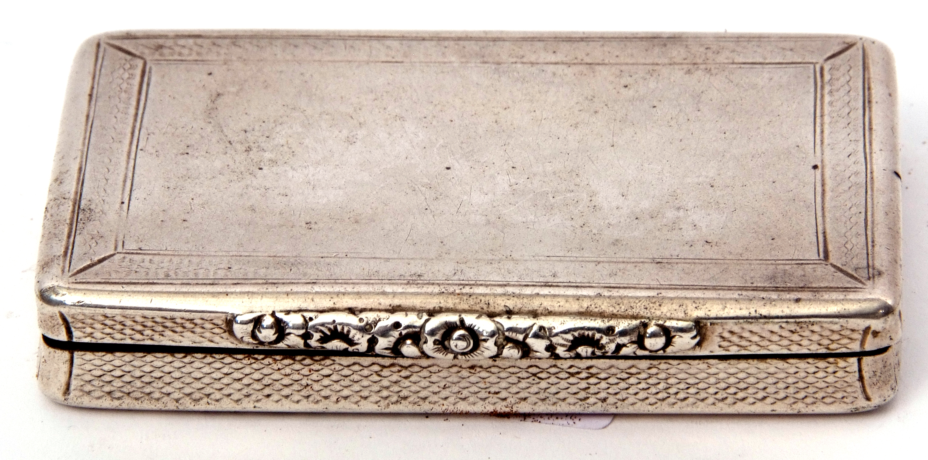 Victorian large rectangular snuff box with rounded and concave edges, worn engine turned