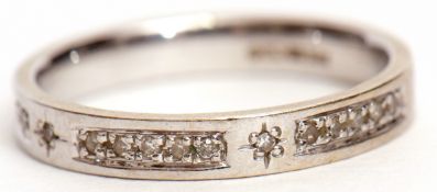 Precious metal diamond set half eternity ring, stamped 750, gross weight 2.9gms, size L/M