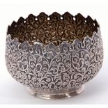 Indian white metal small jardiniere, pierced and embossed with floral and foliate design, plain