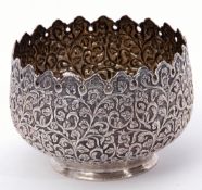 Indian white metal small jardiniere, pierced and embossed with floral and foliate design, plain