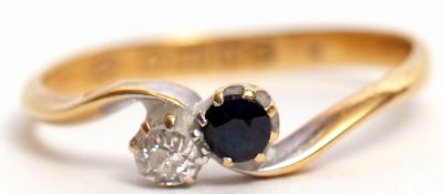 Early 20th century 18ct gold sapphire and diamond cross over ring, set with a circular cut